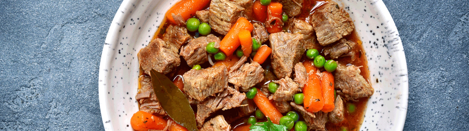 bowl of stew with meat and carrots