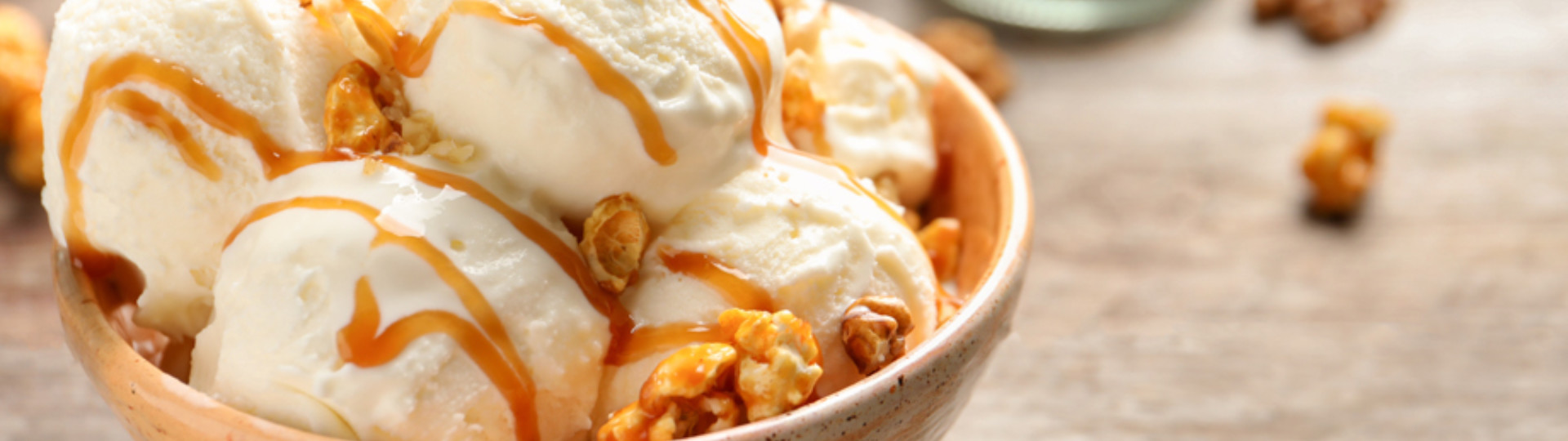 icecream with caramel drizzle in bowl