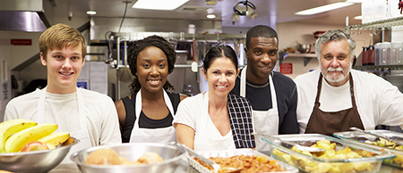 five people in the kitchen